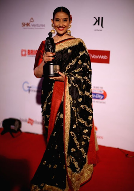 Actress Manisha Koirala Stills In Traditional Black Saree 28